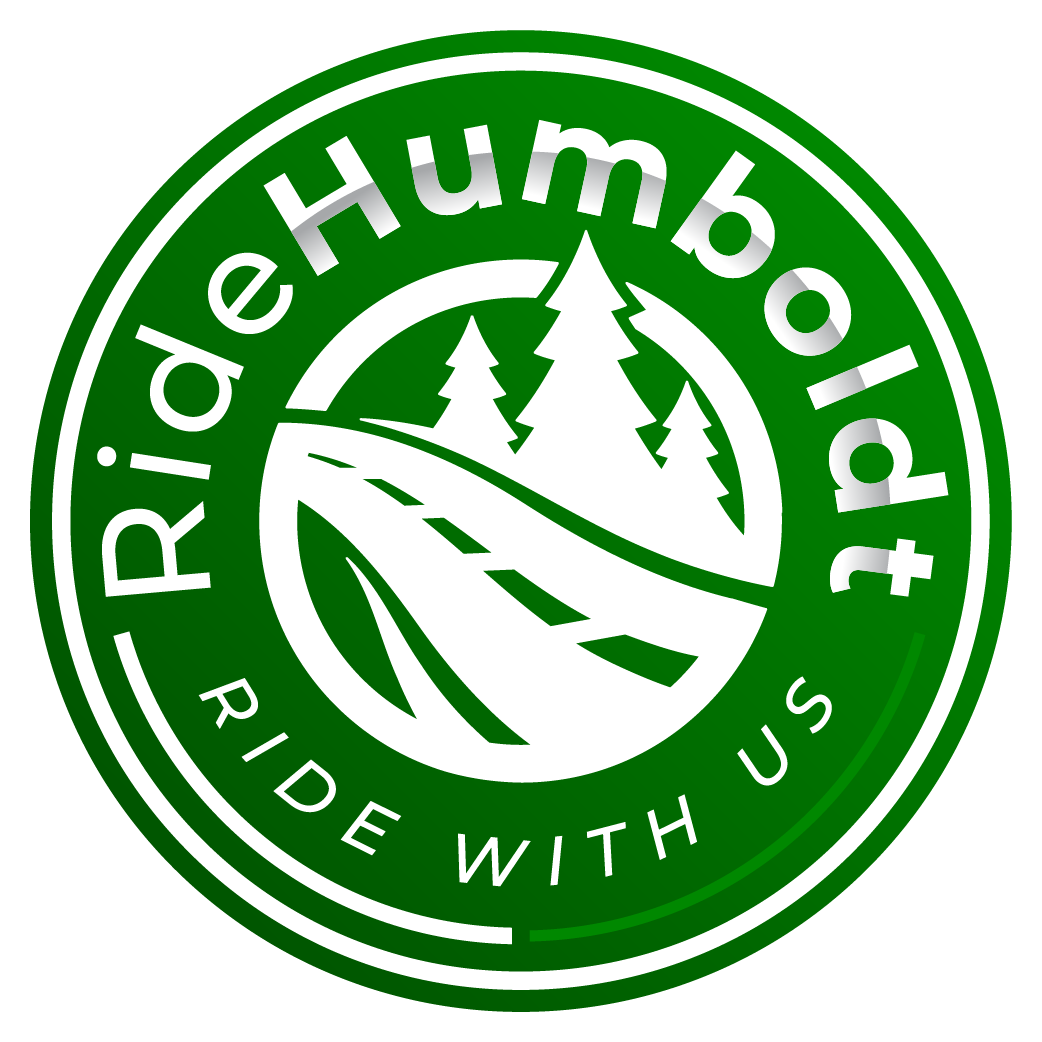Green circular logo with text "Ride Humboldt" and "Ride With Us." Features a road and trees graphic in the center.